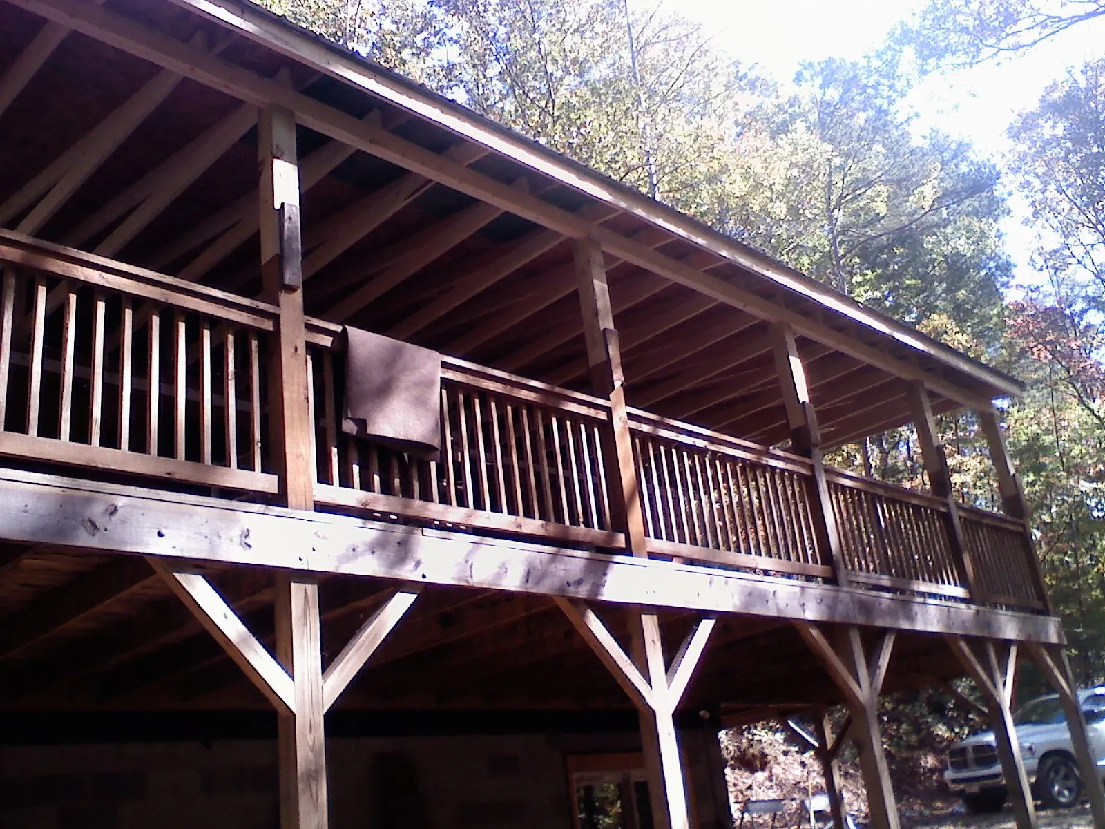 Timber framing under a new elevated porch and deck — Roof Leak Repair in Garnett by Roofing Brothers